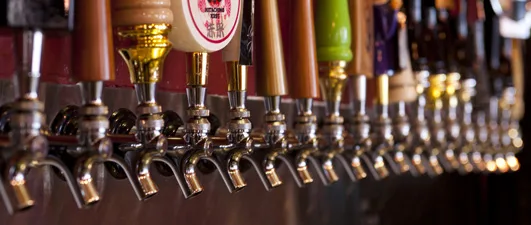 Line of draft beer taps at 621 Tavern & Grille